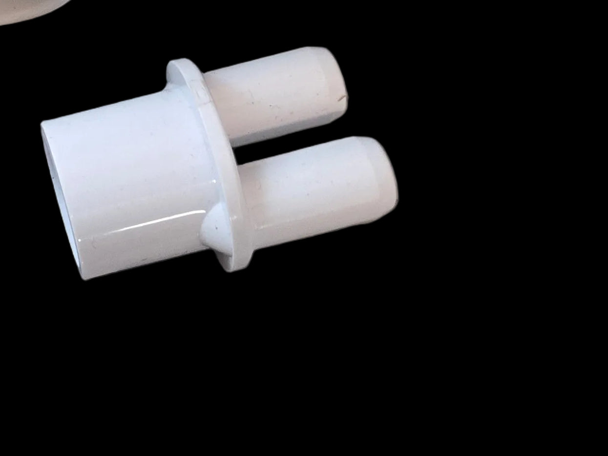 White PVC air adapter with 1/2" socket and two 3/8" ports, designed for air tools by NUWHIRL SYSTEMS.