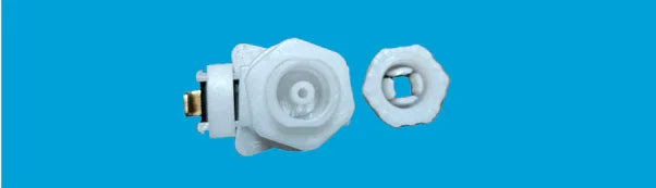 White Whirlpool jetted tub replacement jet parts on blue background