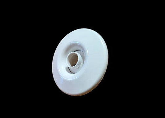 White whirlpool jetted tub jet replacement part on black background
