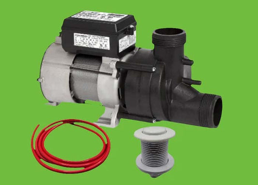Whirlpool jetted tub replacement pump kit with wiring and drain fitting on green background