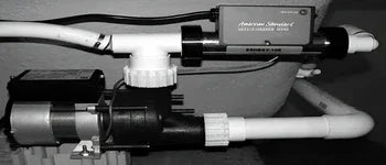 Whirlpool tub replacement pump and plumbing assembly with control box installed