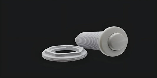 White air switch button and mounting nut for jetted tub replacement on black background