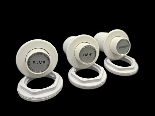 White jetted tub air switch button with pneumatic tubing for whirlpool pump control