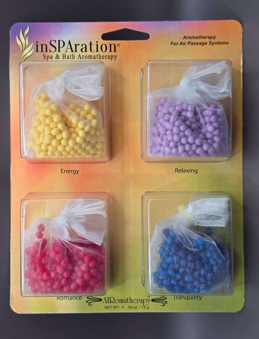 White Aromatherapy Therapy Beads 4 Pack by BALBOA WATER GROUP for whirlpool tubs, shown in a clear, close-up image.