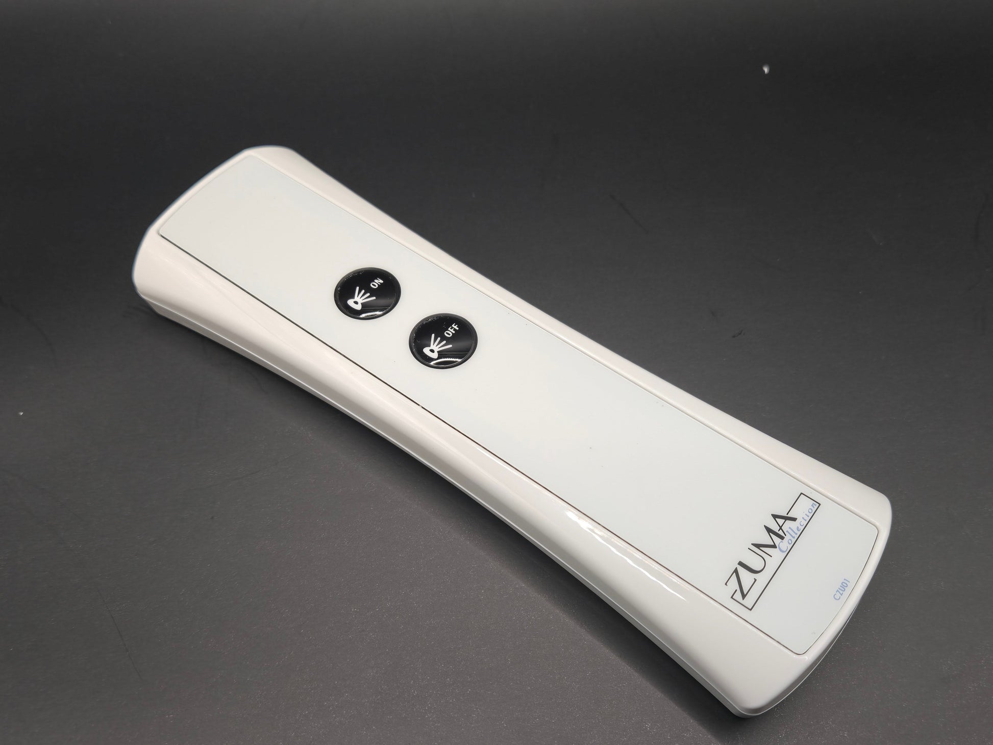 CG AIR SYSTEMS ZUMA Whirlpool Bath On/Off Remote Control for electronic controls, showing buttons and sleek design.