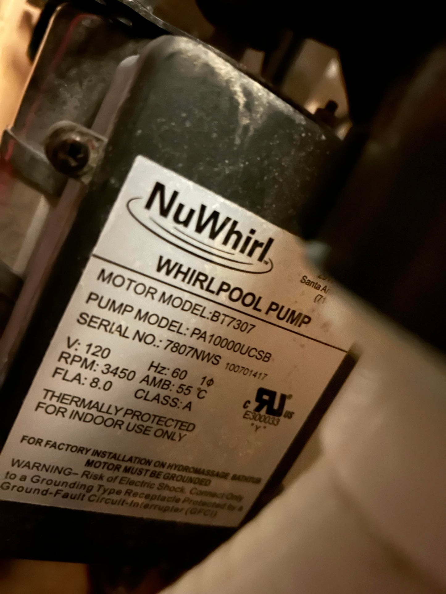 NuWhirl Systems whirlpool water pump model PA10000UCSB BT7307, 8 amp, showing the compact pump with electrical connections.