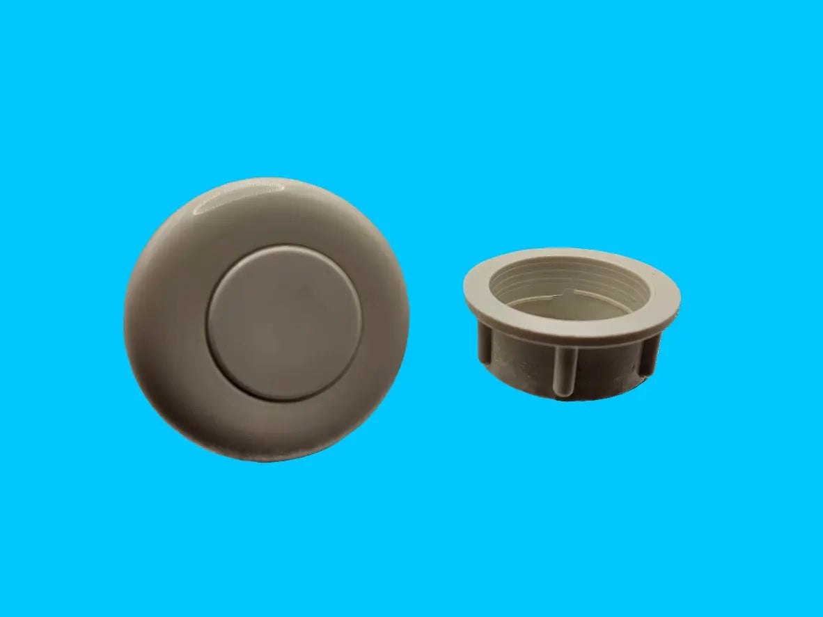 White NuWhirl Air Button for Kohler bathtubs, sleek flush design, durable white plastic, used to activate jet systems.